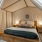 bedroom with a large canopy over the bed